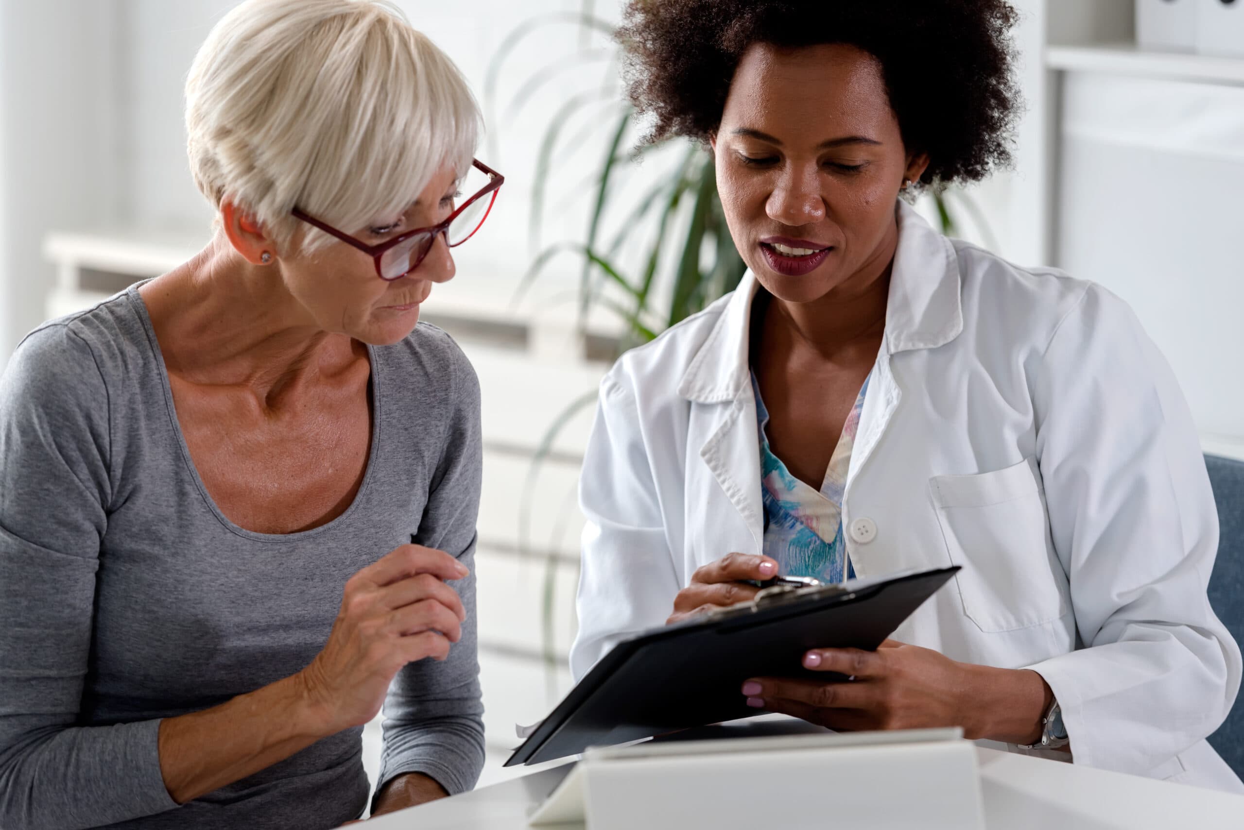 A doctor talking to her patient